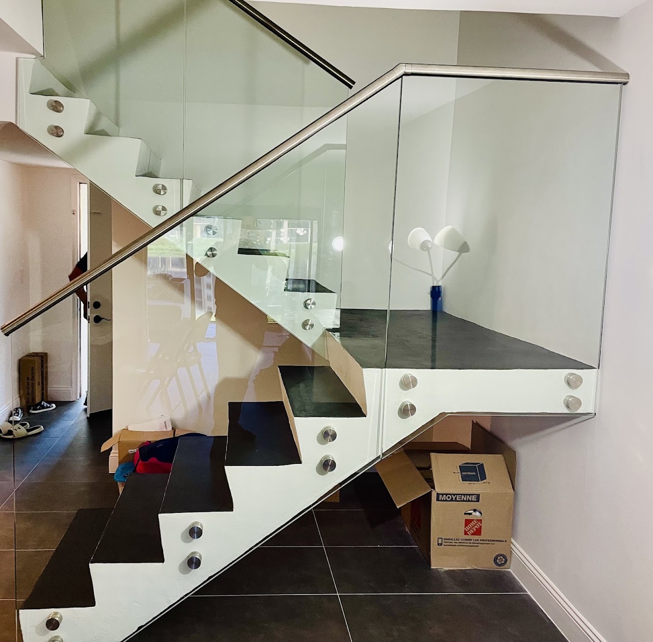 Glass stair railing in a modern home